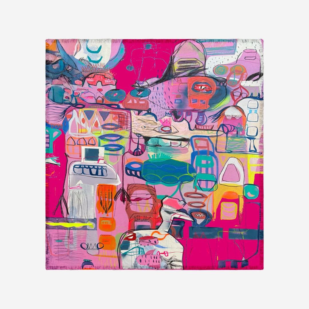 Bloom Silk Scarf by Isabelle Gougenheim shown flat, featuring a vibrant pink, teal, orange and blue abstract design with fringed edges.