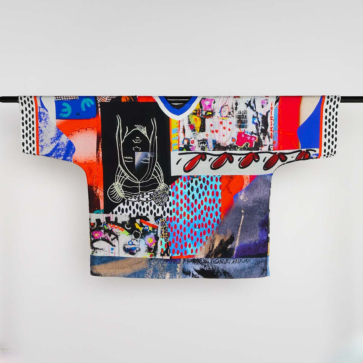 Colorful graphic t-shirt with abstract design on a white background